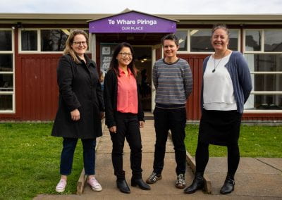 Differential Access to Eye Health Services project team stand outside Te Whare Piringa community centre